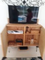 DIY cabinet with faux back hiding the TV lift mechanism 5