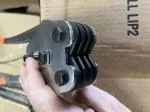 Strapping sealer tool cuts straps 3
