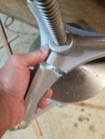 Cast aluminum construction,  not well made.  1