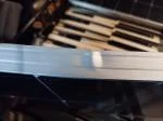 Imballaggio danneggiato e pannello ammaccato.  3