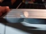 Imballaggio danneggiato e pannello ammaccato.  3