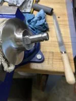 Fitting the cutting blade to the spindle.  5